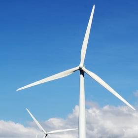 A wind turbine creates renewable energy