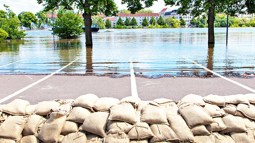 Sandbags stacked as floodwaters threaten
